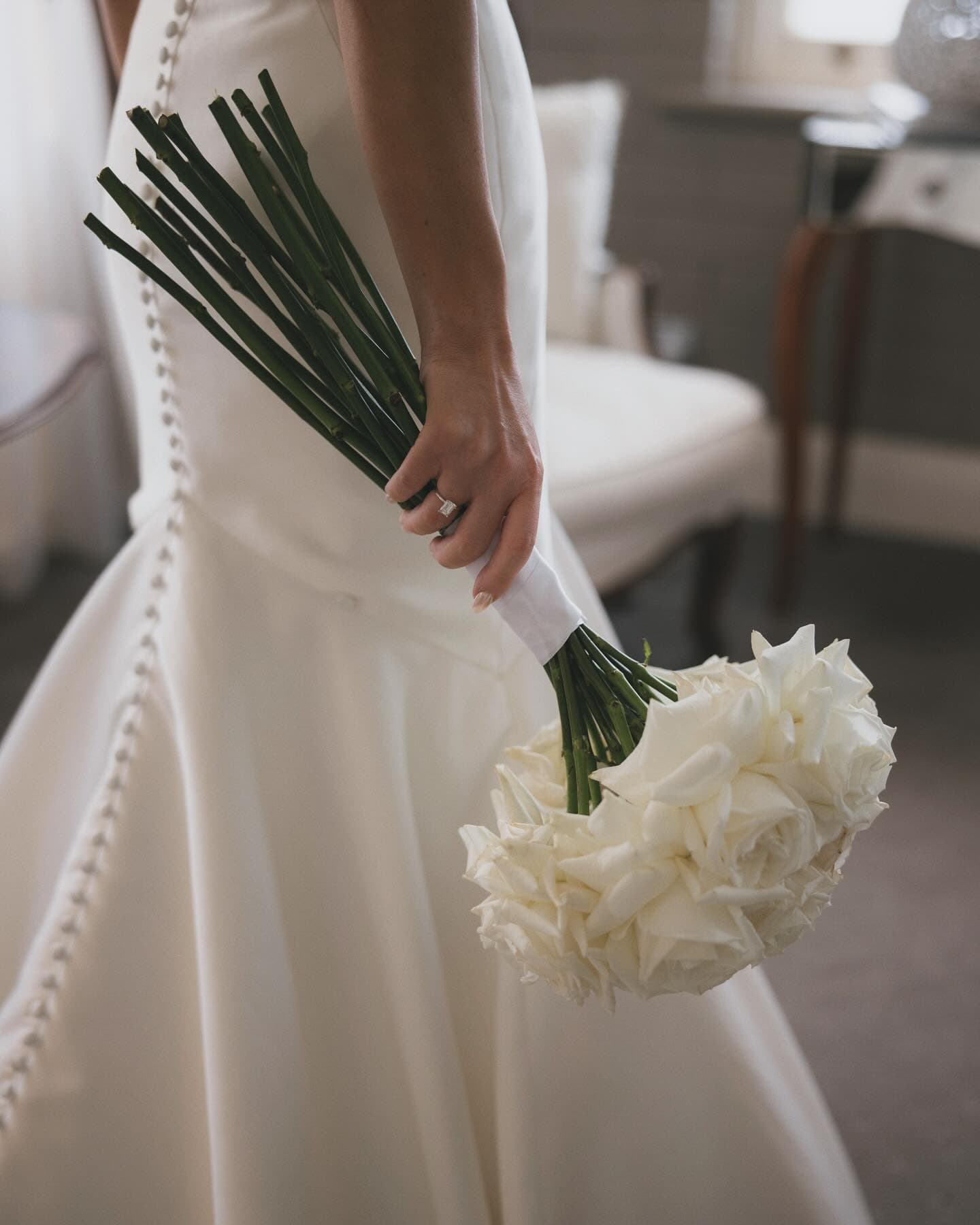 Close detail of bridal bouquet with white roses